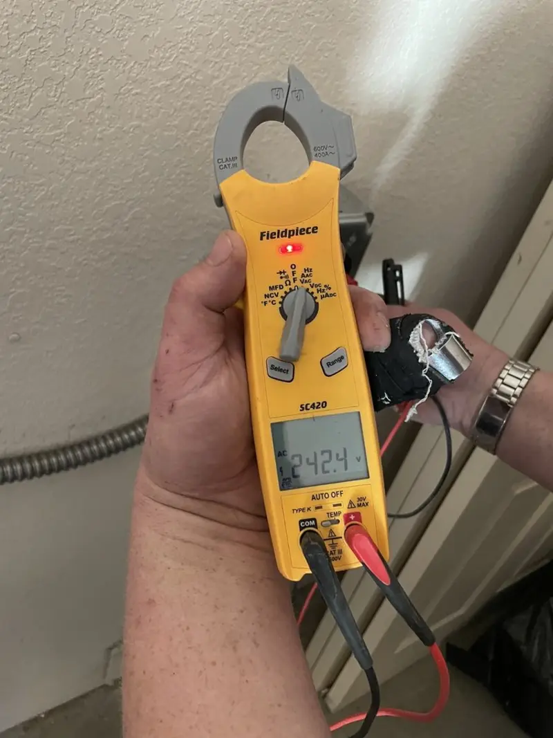 Voltage testing with clamp meter during Circuit Breaker Repair in Ferndale